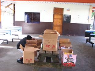 Image #12 - Hurricane Tomas Relief Effort (Packing the goods)